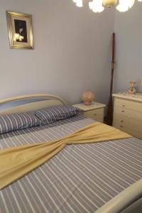 Postel nebo postele na pokoji v ubytování La Vela di Franco