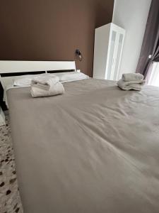 Postel nebo postele na pokoji v ubytování La PortaVecchia - #Home