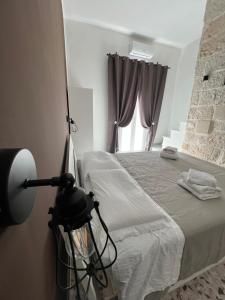 Postel nebo postele na pokoji v ubytování La PortaVecchia - #Home