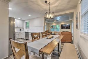 a dining room and kitchen with a table and chairs at Stylish Wilmington Home, 2 Mi to Riverwalk! in Wilmington