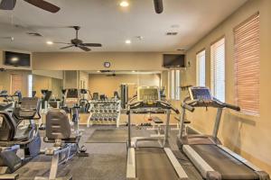 a gym with several treadmills and machines in it at Scottsdale Condo with Balcony and Resort Amenities! in Scottsdale