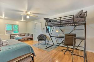 a bedroom with a bunk bed and a desk at Poconos Gem Fire Pit, Hot Tub, Community Pool in East Stroudsburg