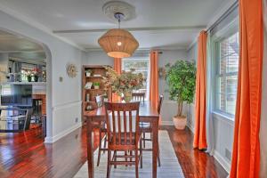 a dining room with a table and chairs at Vibrant Hyattsville Home 7 Mi to Downtown DC! in Hyattsville