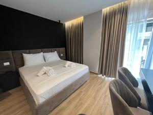 Letto o letti in una camera di Hotel LEON - Beach Front