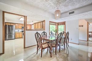 a dining room with a table and chairs at Bryan Home with Deck and Yard about 4 Mi to Texas A and M! in Bryan