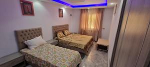 L'Andalousia "10 minutes from airport"客房内的一张或多张床位