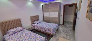 L'Andalousia "10 minutes from airport"客房内的一张或多张床位
