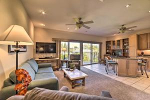 a living room with a couch and a table at Gorgeous Oceanfront Kihei Condo with Balcony! in Wailea