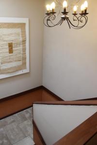Postel nebo postele na pokoji v ubytování Logis Hôtel Les Pages
