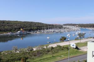 a view of a marina with boats in the water at Apartments with a parking space Pula - 7681 in Pula