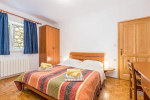 Posteľ alebo postele v izbe v ubytovaní Apartments with a parking space Moscenicka Draga, Opatija - 7766