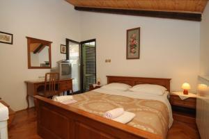 Ένα ή περισσότερα κρεβάτια σε δωμάτιο στο Apartments and rooms with parking space Moscenicka Draga, Opatija - 7772