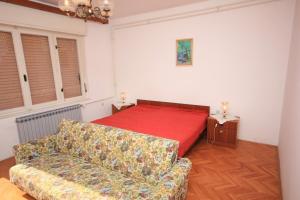 Gulta vai gultas numurā naktsmītnē Apartments with a parking space Lovran, Opatija - 7807
