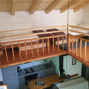 an overhead view of a room with two bunk beds at Studio Merag 7877a in Cres