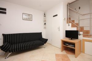 Μια τηλεόραση ή/και κέντρο ψυχαγωγίας στο Apartments with WiFi Mali Losinj (Losinj) - 7943