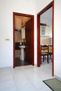 Kuchyňa alebo kuchynka v ubytovaní Apartment Tri Zala 9237a
