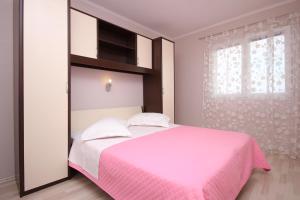 Postel nebo postele na pokoji v ubytování Seaside apartments with a swimming pool Prigradica, Korcula - 9290 + 33 fotografií