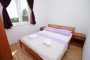 Postel nebo postele na pokoji v ubytování Apartments with a parking space Lumbarda, Korcula - 9271