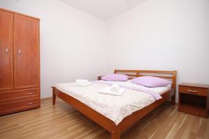 Postel nebo postele na pokoji v ubytování Apartments with a parking space Lumbarda, Korcula - 9271