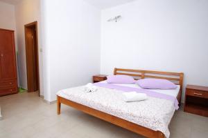 Postel nebo postele na pokoji v ubytování Apartments with a parking space Lumbarda, Korcula - 9271