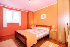 Postel nebo postele na pokoji v ubytování Apartments by the sea Lumbarda, Korcula - 9172