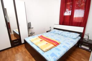 Posteľ alebo postele v izbe v ubytovaní Apartments with a parking space Lumbarda, Korcula - 9262