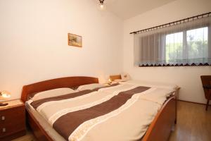 Posteľ alebo postele v izbe v ubytovaní Apartments with a parking space Moscenicka Draga, Opatija - 7746