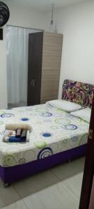 Postel nebo postele na pokoji v ubytování montecarlos hotel