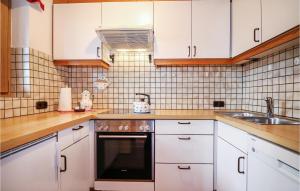 Kuchyň nebo kuchyňský kout v ubytování Ferienhaus - St, Koloman