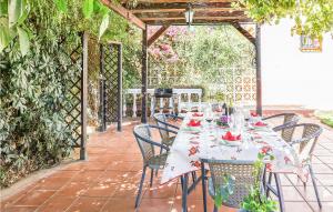 A garden outside Cozy Home In Utrera With Swimming Pool