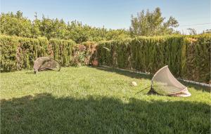 A garden outside Cozy Home In Utrera With Swimming Pool