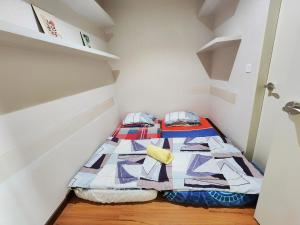 Postel nebo postele na pokoji v ubytování Cozy Suite @ I-City