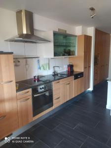 Kuchyň nebo kuchyňský kout v ubytování Enzian 176 Al , Wohnung C3