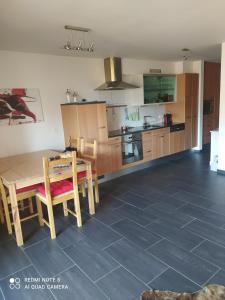 A kitchen or kitchenette at Enzian 176 Al , Wohnung C3