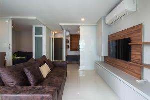 TV a/nebo společenská místnost v ubytování Mantra Beach condominium M257