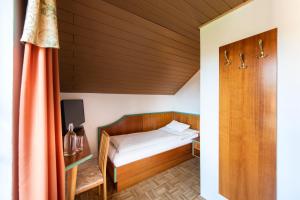 Postel nebo postele na pokoji v ubytování Hotel Altneudörflerhof