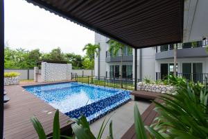 Bazén v ubytování Mantra Beach condominium M257 nebo v jeho okolí