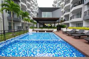 Bazén v ubytování Mantra Beach condominium M257 nebo v jeho okolí