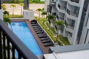 Bazén v ubytování Mantra Beach condominium M257 nebo v jeho okolí