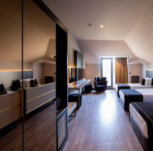 Cama ou camas em um quarto em MENALO HOTEL PREMIUM ISTANBUL AIRPORT