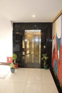 Manī MājraHotel Red Apple Near Railway Station Chandigarh的相册照片