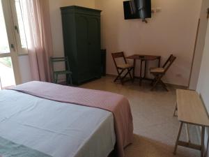 Postel nebo postele na pokoji v ubytování FarmaMia