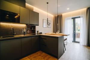 Kuchyňa alebo kuchynka v ubytovaní Executive Apartments Taborska