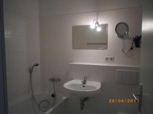 Ein Badezimmer in der Unterkunft Zinnowitz Residenz Sanssouci