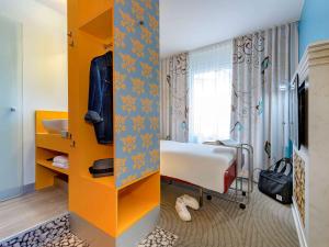 TV a/nebo společenská místnost v ubytování ibis Styles Hotel Berlin Mitte