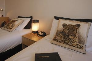 Postel nebo postele na pokoji v ubytování Big Five Motel