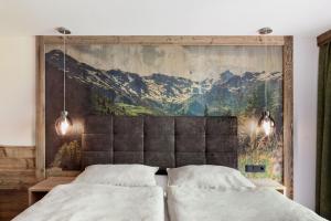 Postel nebo postele na pokoji v ubytování Berggasthaus Höllensteinhütte + 30 fotografií