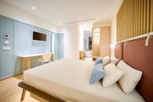 Postel nebo postele na pokoji v ubytování Hotel Leonor Conil