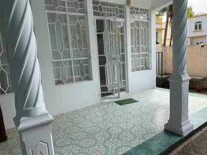 Balkón nebo terasa v ubytování TOOFANVILLA