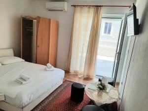 Postel nebo postele na pokoji v ubytování Sobe Centar Baška Voda